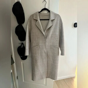 Wool trench coat​ w/ spot stain on the collar. Easily cleanable